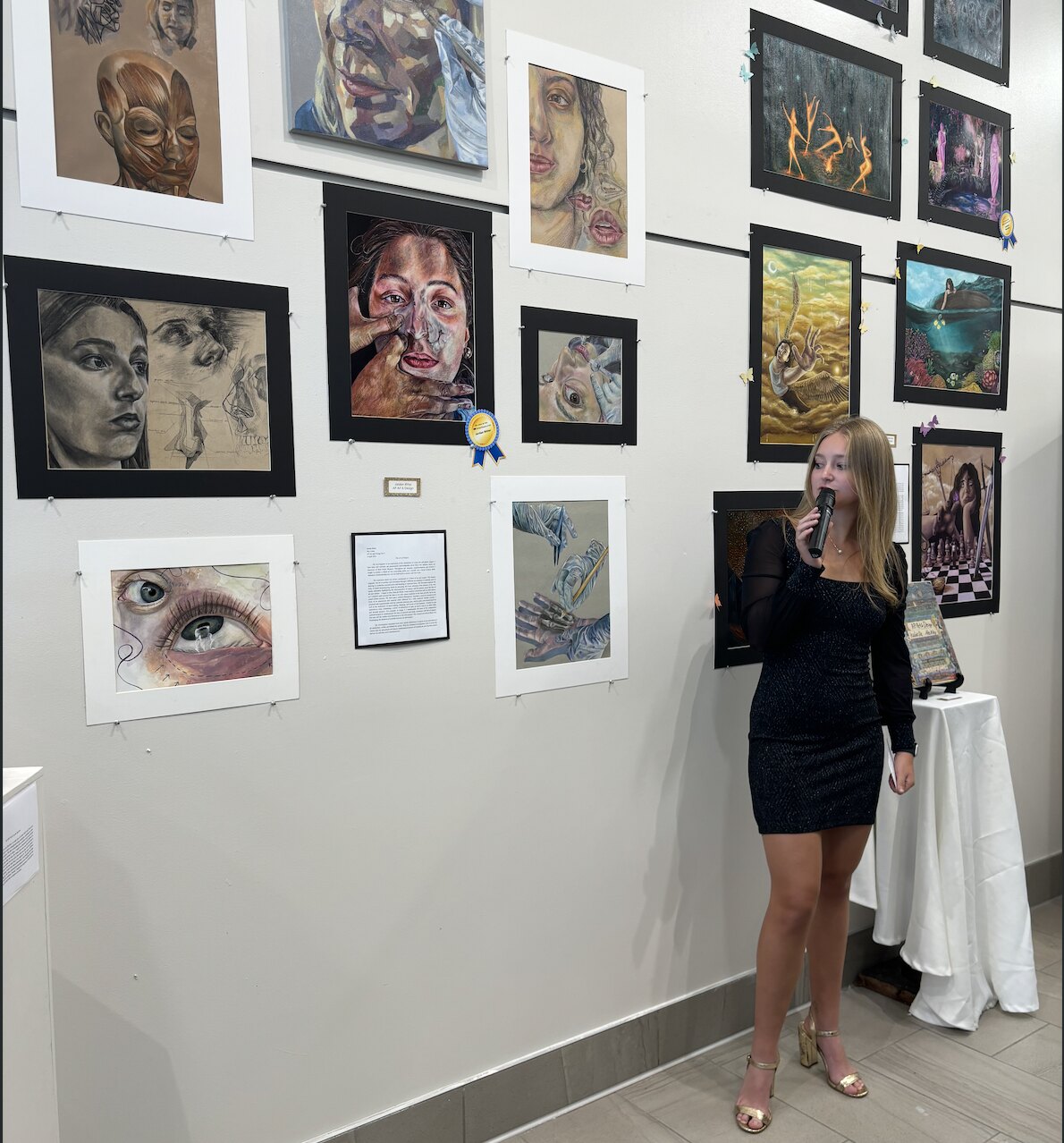 Jordan Ritter speaking at an exhibition
